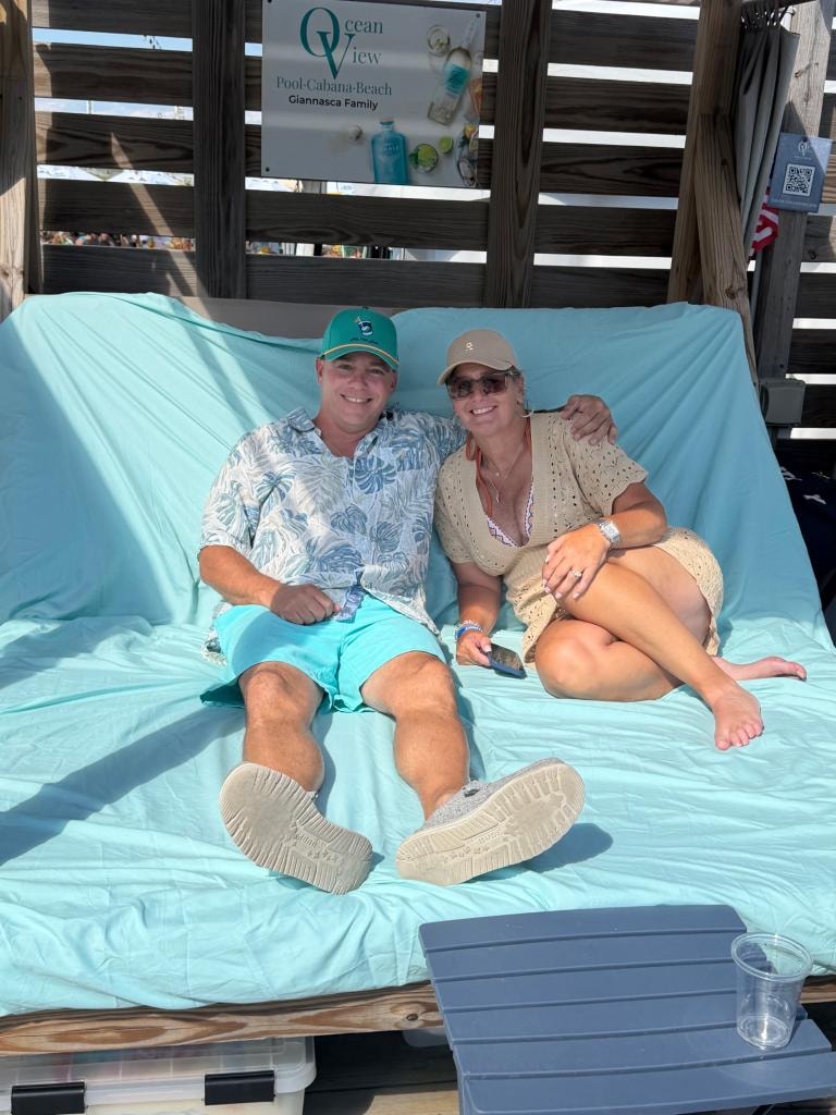 Couple relaxing in their private cabana