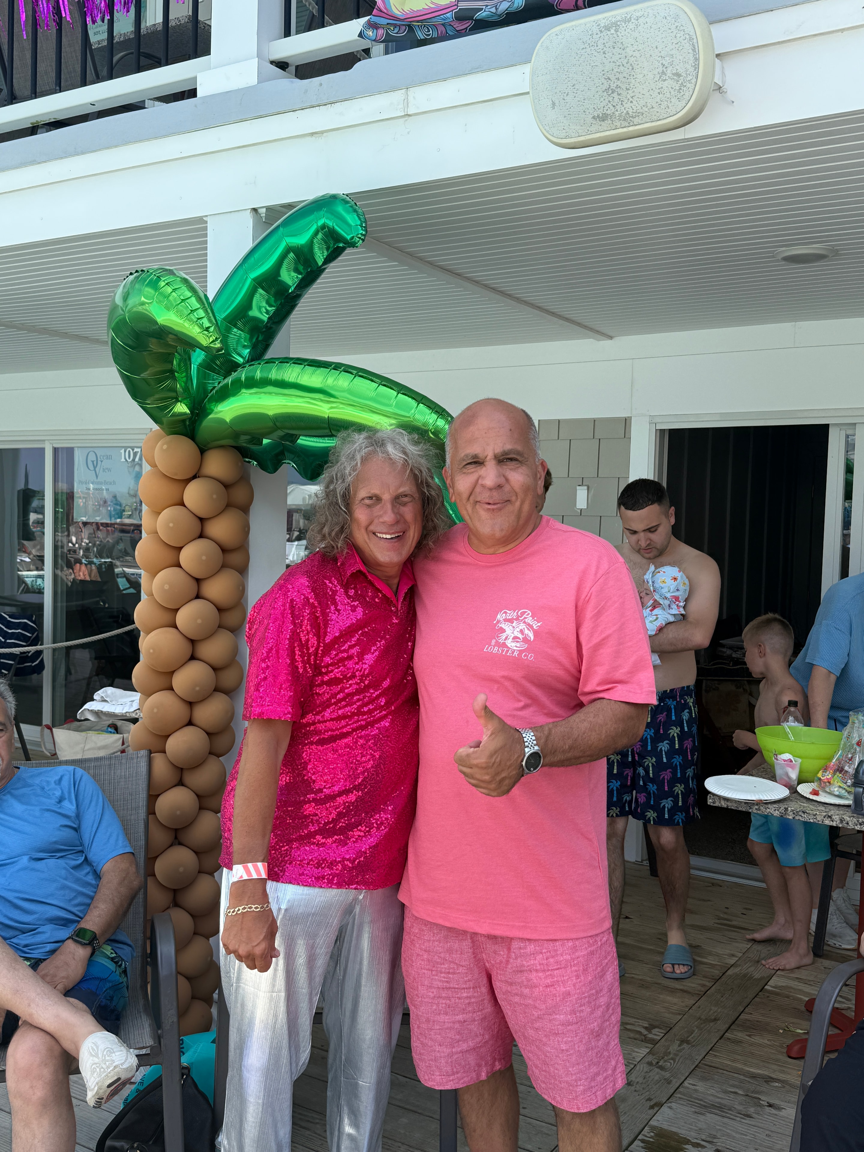 Members at a tropical themed event