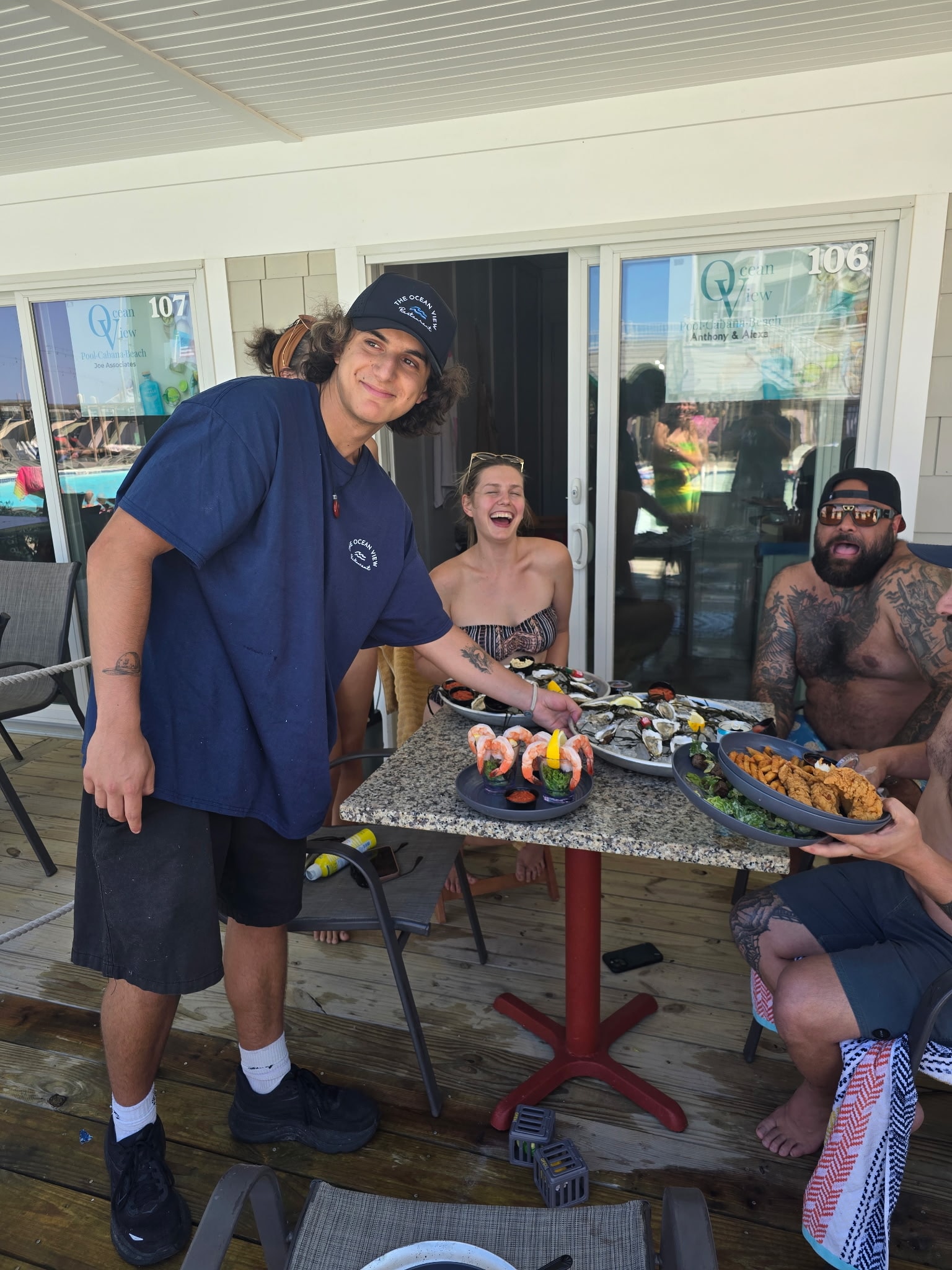 Family enjoying a member event poolside