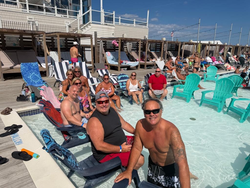 Members enjoying the pool together at a group event