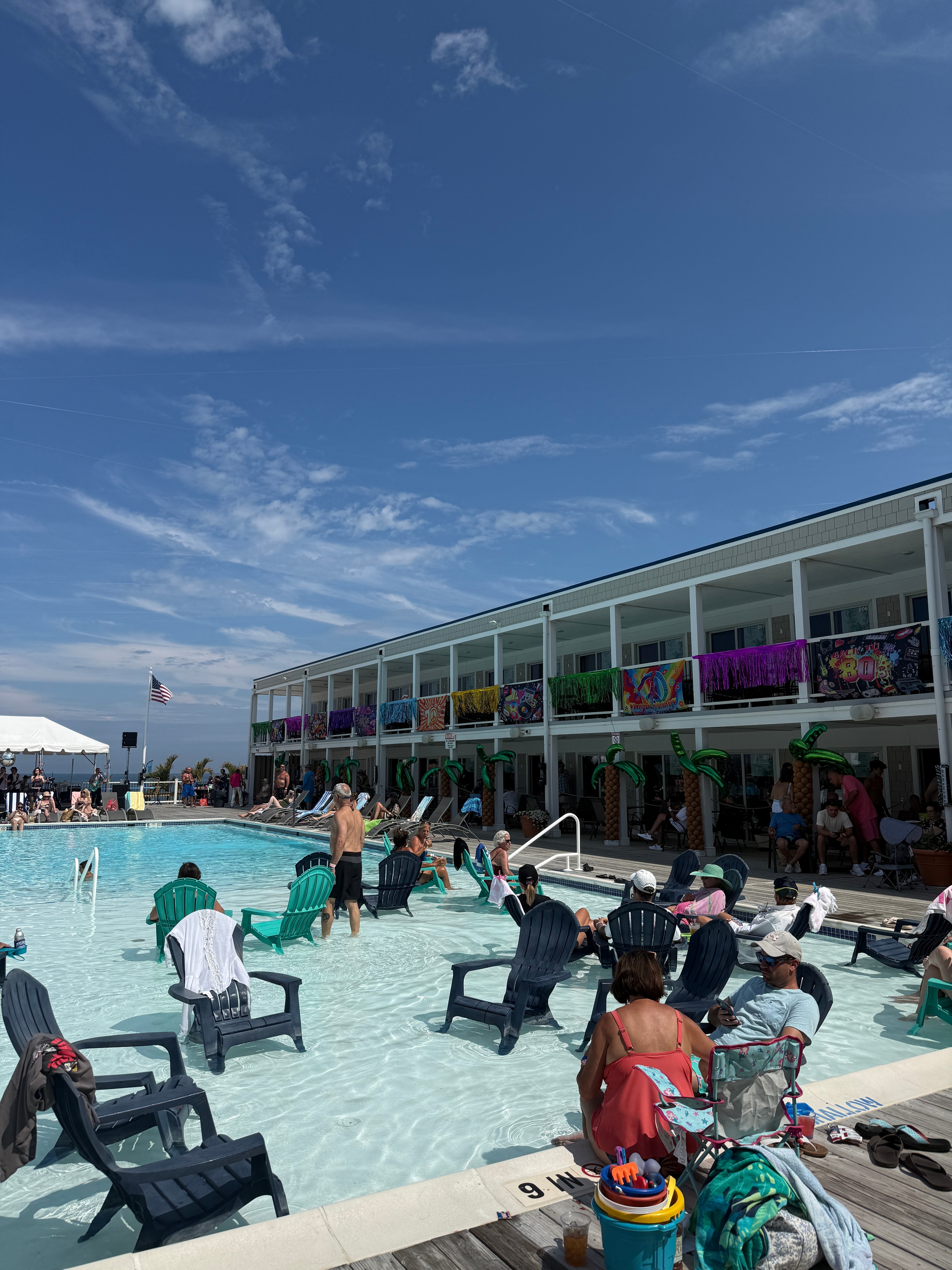 Members enjoying a pool party event
